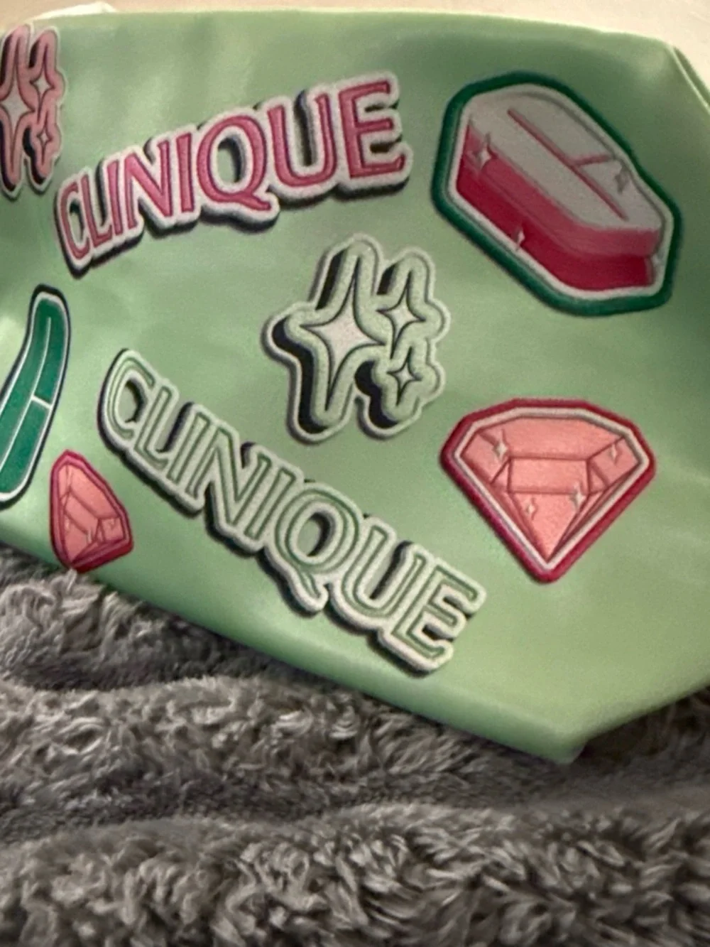 Clinique Mint Green Kids Cosmetic Pouch with Pink Accents and Patch Logos